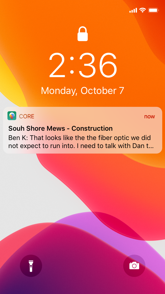 iOS lock screen showing a push notification received from the coRE app.